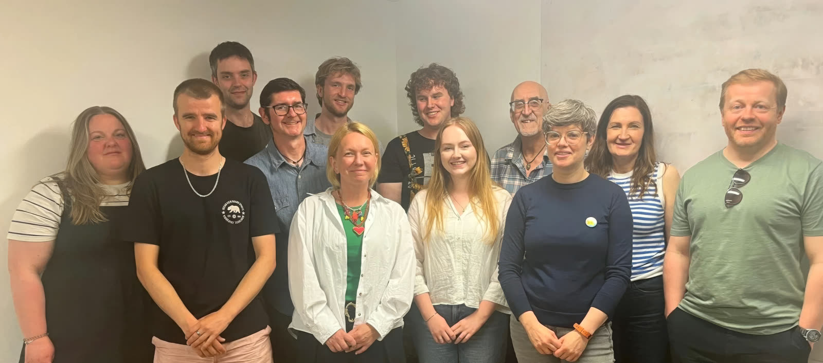 The Health All Round team standing together at the charity's Edinburgh base