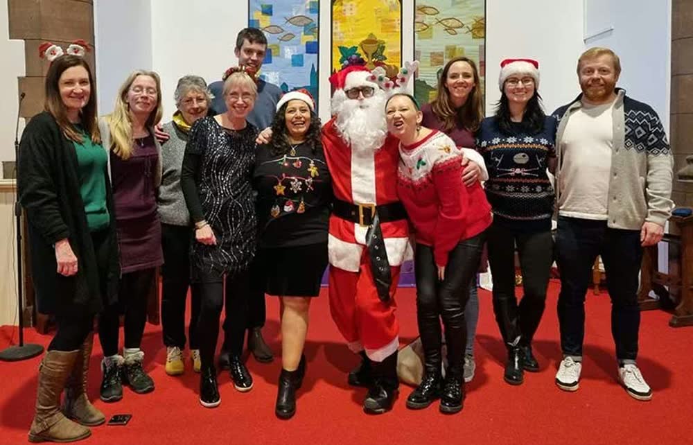 Smiling group at the Health All Round Christmas party